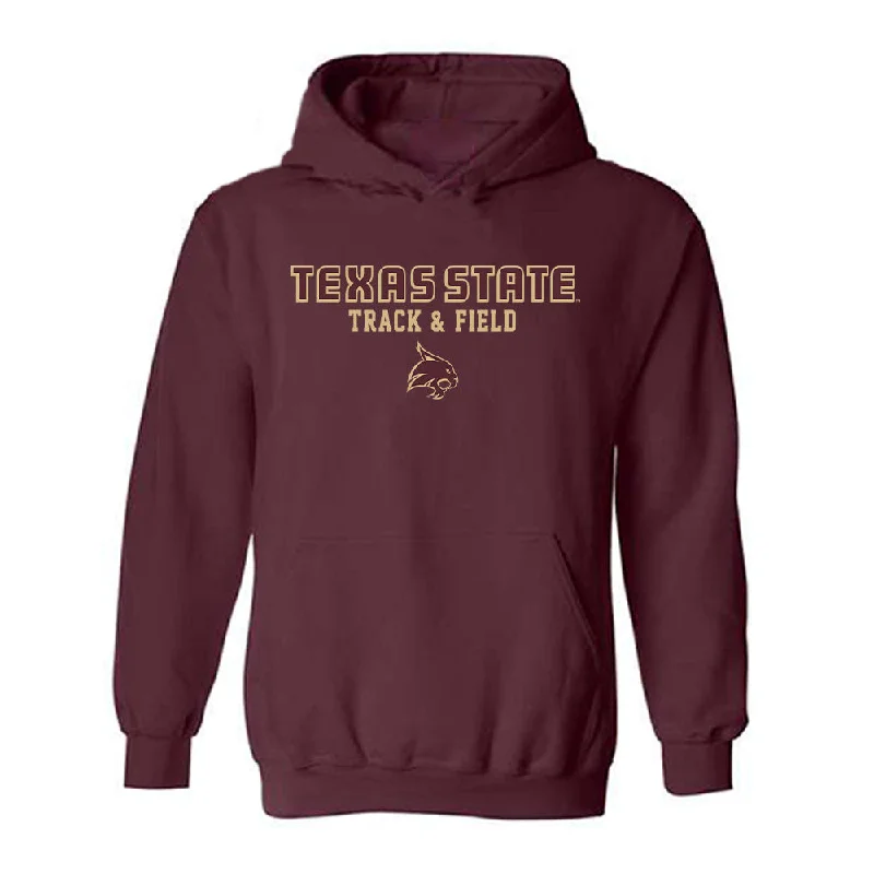 Texas State - NCAA Women's Track & Field : Sydney Magennis - Classic Shersey Hooded Sweatshirt Hoodie with Hem Applique Textured Unique