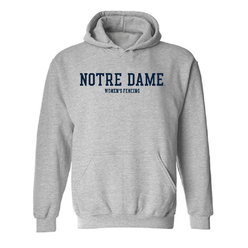 Notre Dame - NCAA Women's Fencing : Atara Greenbaum - Classic Fashion Shersey Hooded Sweatshirt Hoodie with Hem Applique Textured Unique Notre Dame - NCAA Women's Fencing : Atara Greenbaum - Classic Fashion Shersey Hooded Sweatshirt Hoodie with Hem Applique Textured Unique