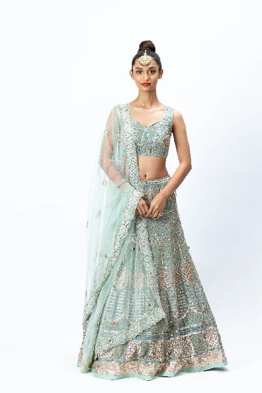 Mint Green Hand-embroidered Lehenga paired with Hand-embroidered Blouse, Hand-embroidered Dupatta and Hand-embroidered Jacket with Buttis Rayon Fabric Velvet Fabric Corduroy Fabric Mint Green Hand-embroidered Lehenga paired with Hand-embroidered Blouse, Hand-embroidered Dupatta and Hand-embroidered Jacket with Buttis Rayon Fabric Velvet Fabric Corduroy Fabric